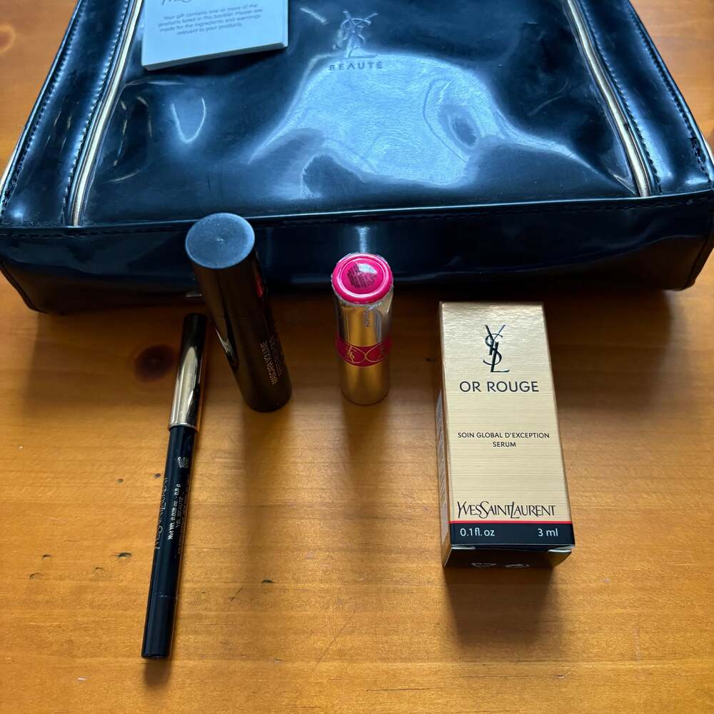 Yves Saint Laurent Black Leather Makeup Bag with Beauty Products